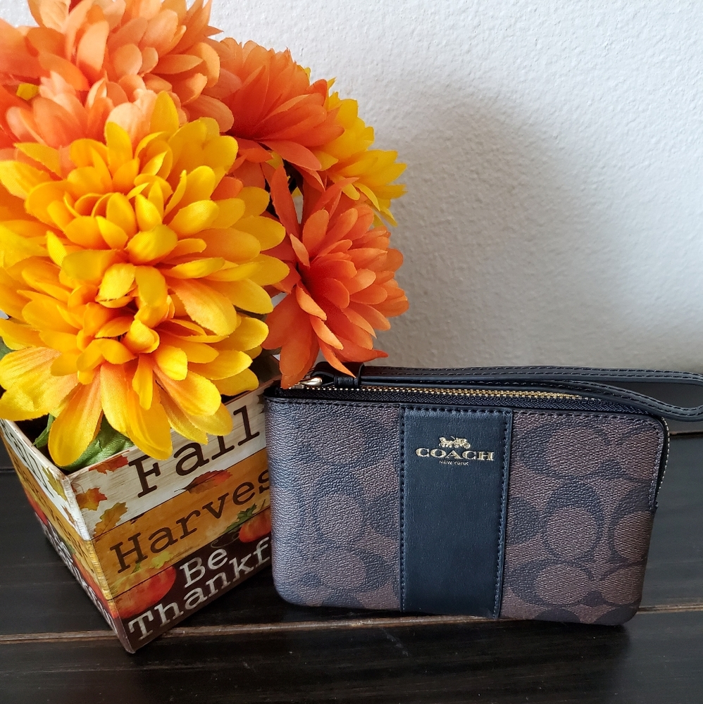 NWT black and brown Coach wristlet ‼️ SOLD ‼️